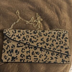 Elegant Gold and Black Clutch